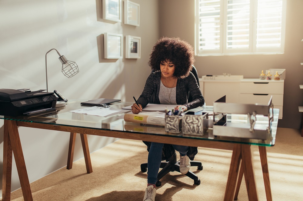 woman working at home office desk