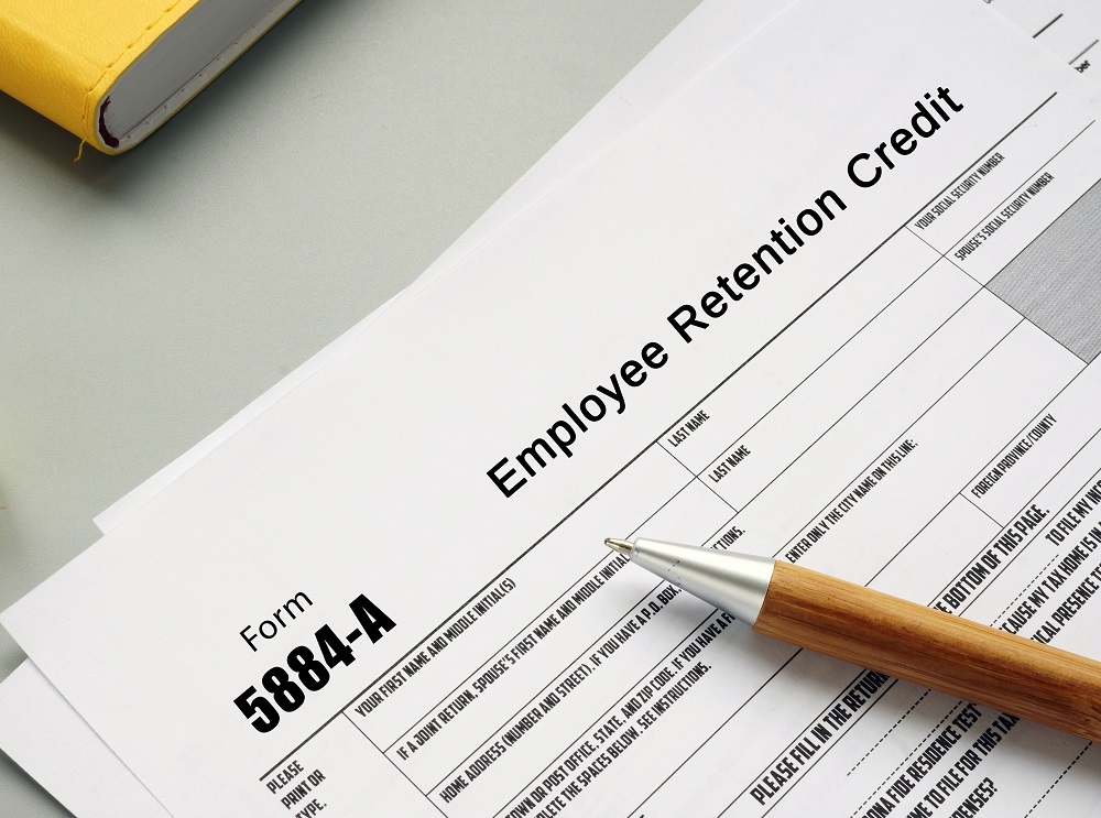 Employee Retention Credit form and pen on desk