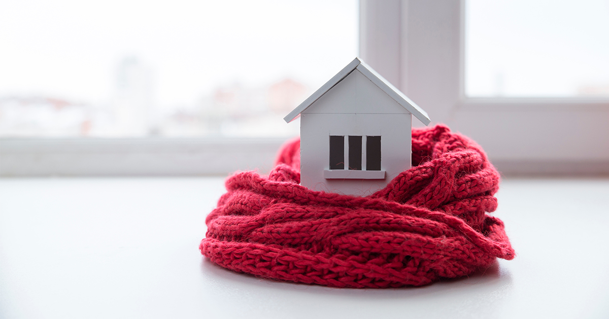 figurine home wrapped in a scarf
