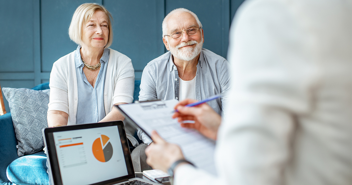 two people talking to financial planner