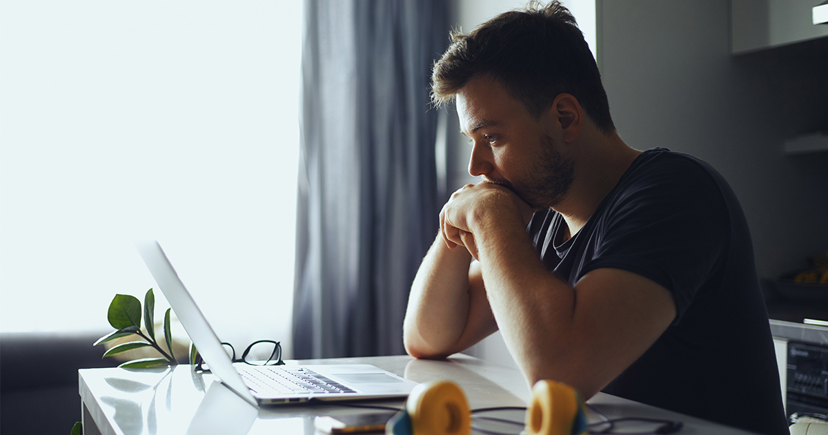 person looking concerned at computer