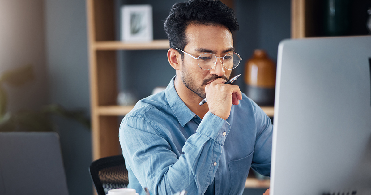 person at desktop computer