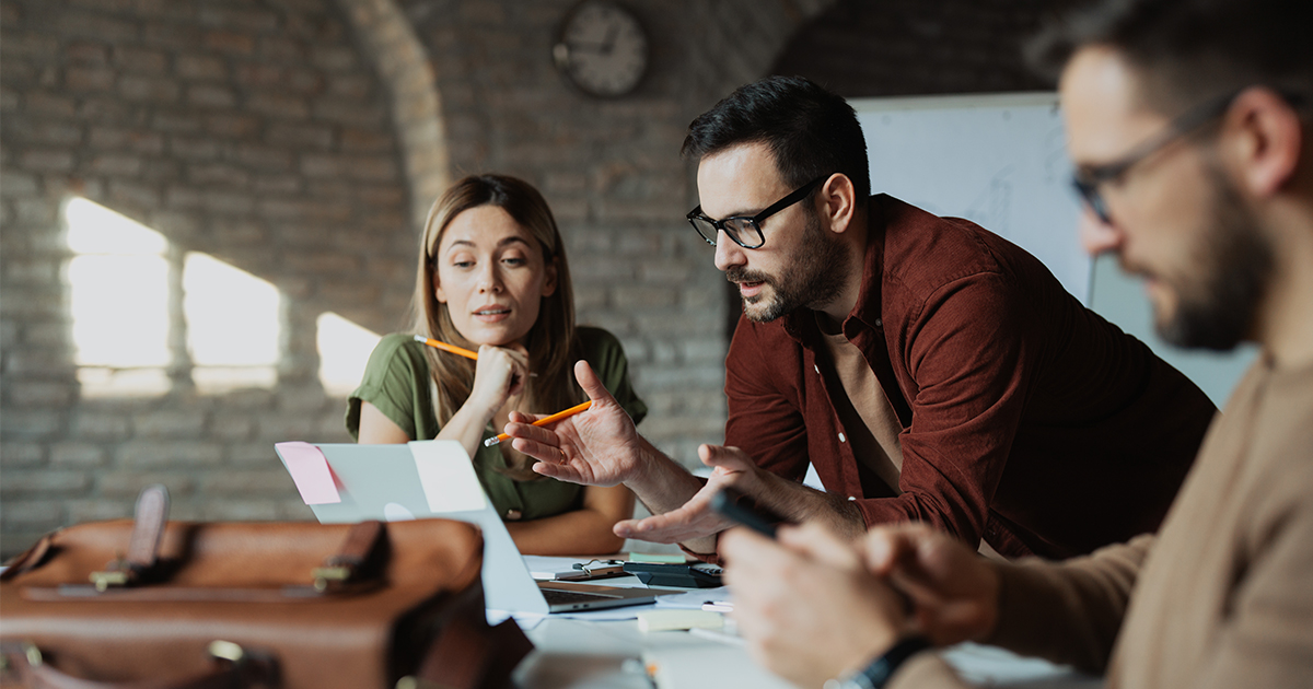 people business planning at a desk