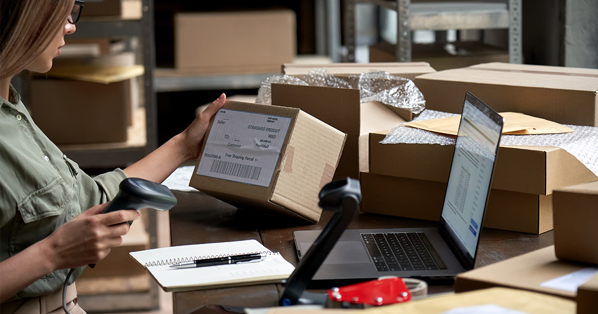 person scanning an order to ship out