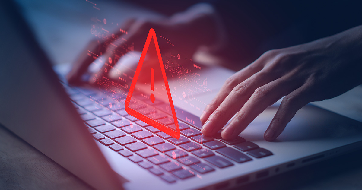 alert icon over laptop