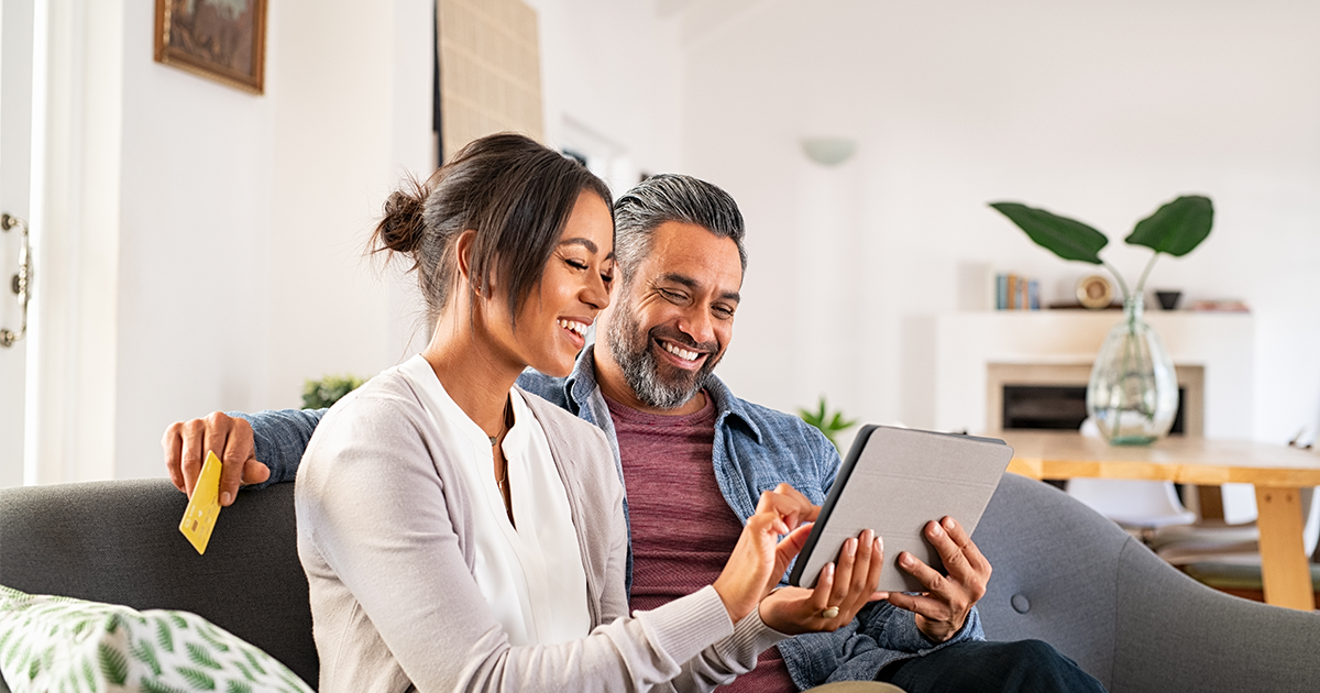 couple looking at banking tools on tablet