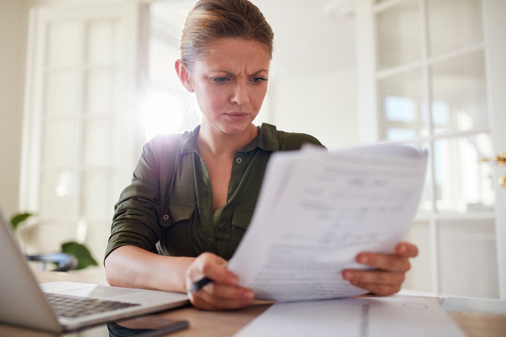 Woman looking at paperwork