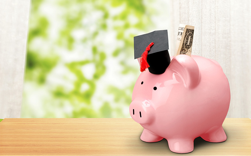 piggy bank with college cap
