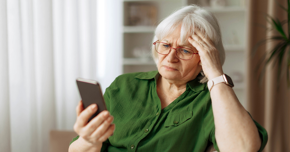woman looking concerned at screen